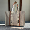 LAGRE WOODY TOTE BAG 45 IN BEIGE LINEN CANVAS BLACK WEBBING LOGO EMBROIDER ORANGE CALFSKIN