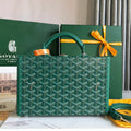 GRAND HÔTEL TRUNK BAG 24 IN GREEN GOYARDINE CANVAS AND CALFSKIN
