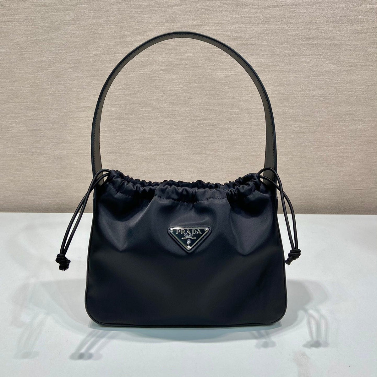 PRADA SMALL DRAWSTRING BAG 23 IN BLACK RE-NYLON