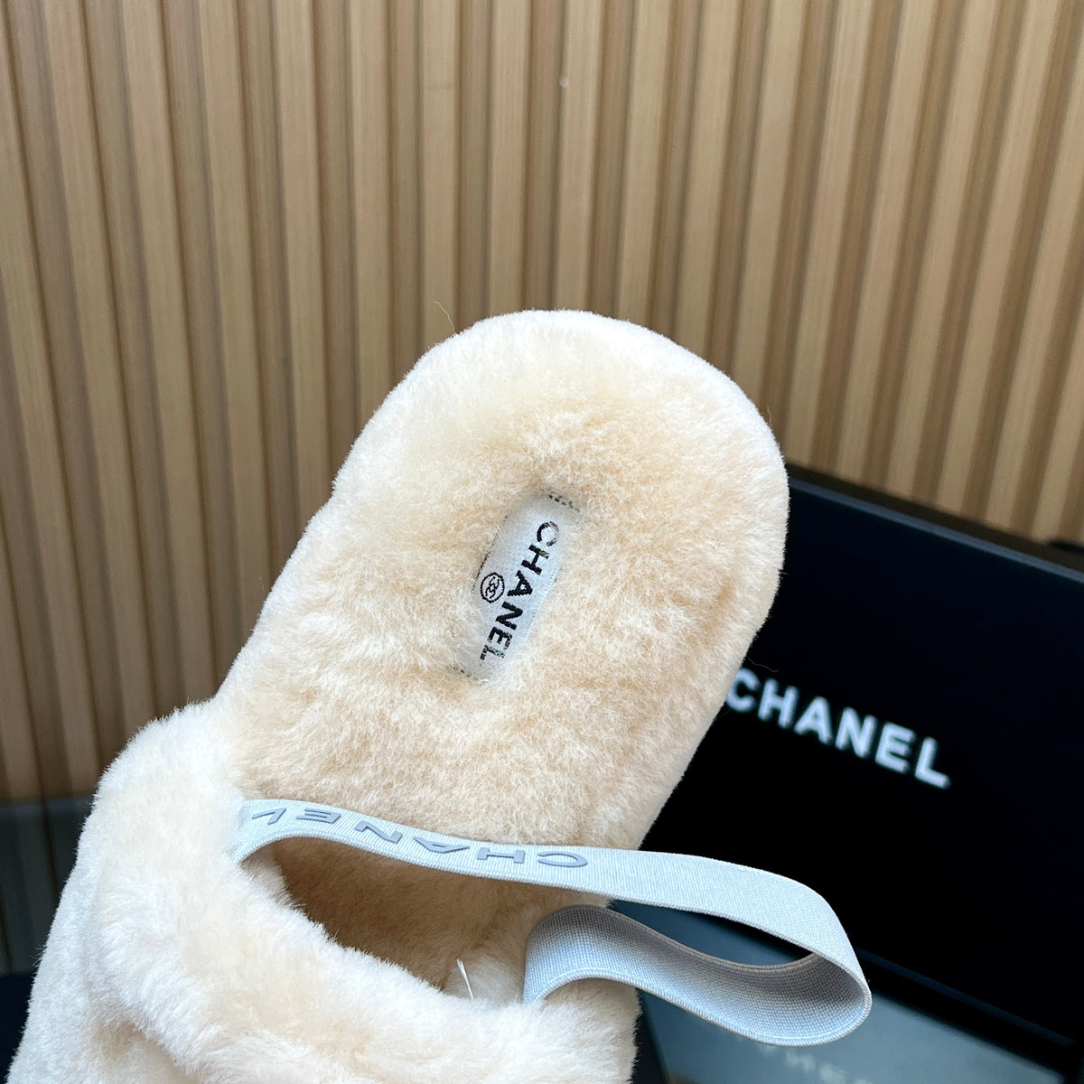 CHANEL 25S THICK-SOLED FURRY SLIPPERS WITH ELASTIC STRAPS IN BEIGE FUR