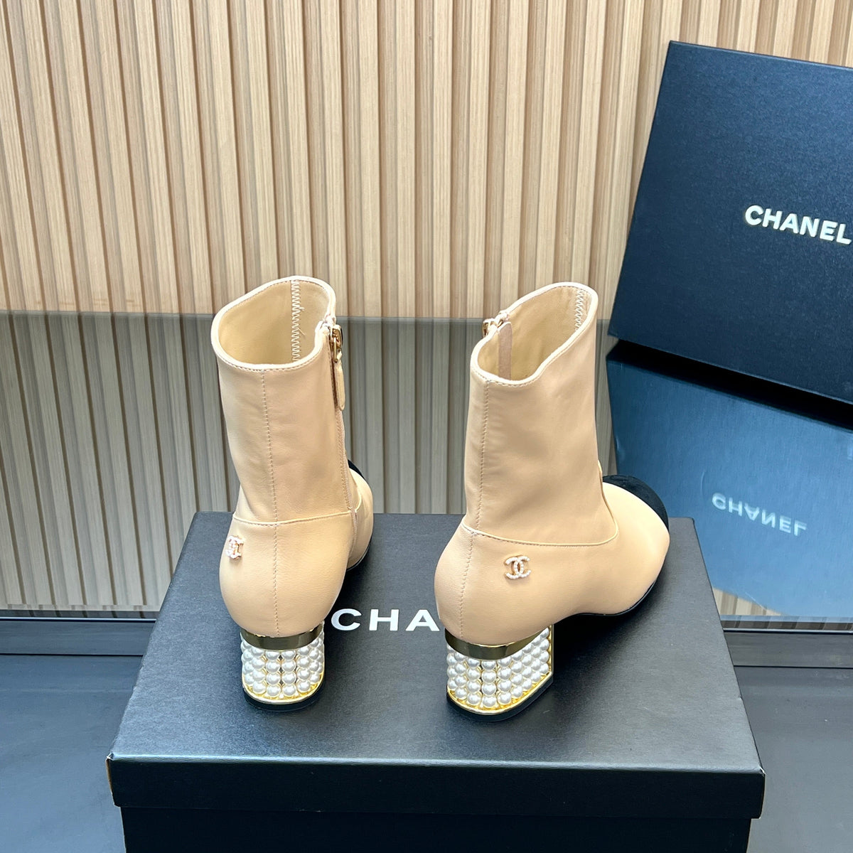 CHANEL 25S TALL BOOTS WITH PEARL DETAILS 50MM IN BEIGE CALFSKIN AND BLACK SUEDE