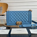 CHANEL 25S BOY BAG 25 IN BLUE CAVIAR