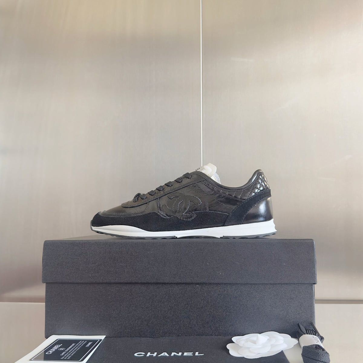 CHANEL 25S SNEAKERS 20MM IN BLACK GLOSSY CALFSKIN
