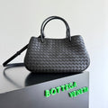 BOTTEGA VENETA 25S BASKET BAG 31 IN BLACK CALFSKIN GOLD HARDWARE