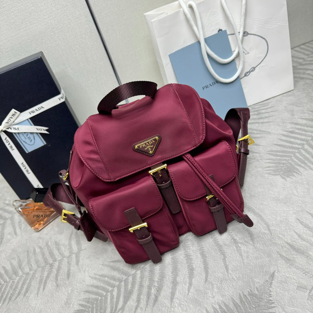 PRADA 25S RE-EDITION 1978 SMALL BACKPACK 28 IN BURGUNDY RE-NYLON