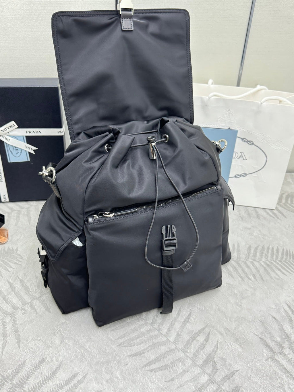 PRADA 25S EXPLORE BACKPACK 39 IN BLACK RE-NYLON AND CALFSKIN