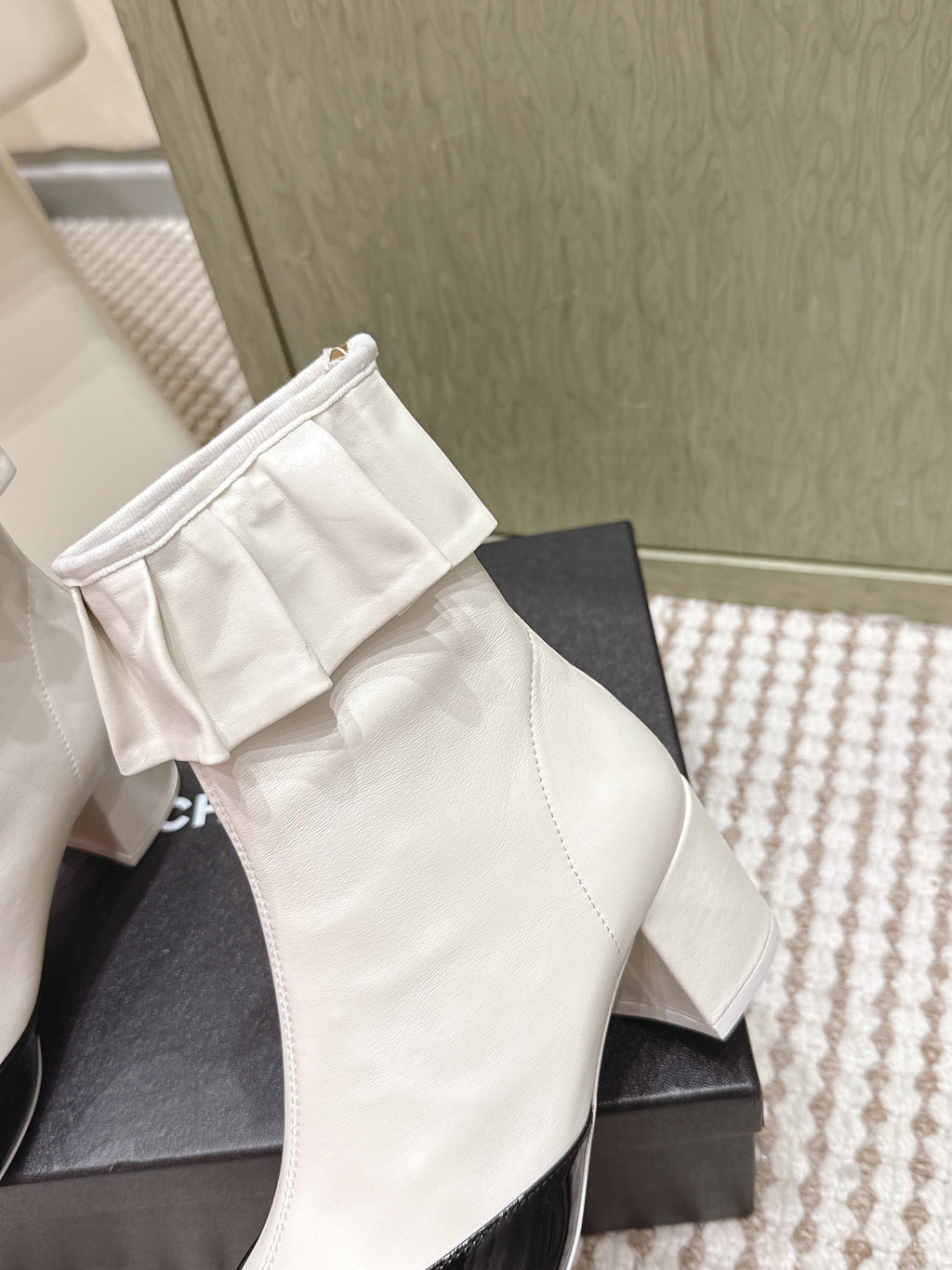 CHANEL 25S ANKLE BOOTS IN  WHITE CALFSKIN AND BLACK GLOSSY TOE RUCHED