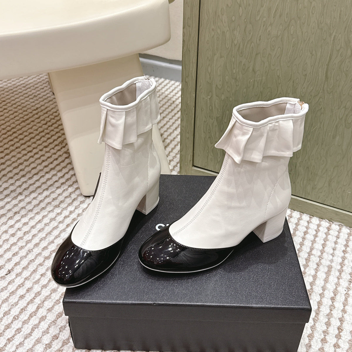 CHANEL 25S ANKLE BOOTS IN  WHITE CALFSKIN AND BLACK GLOSSY TOE RUCHED