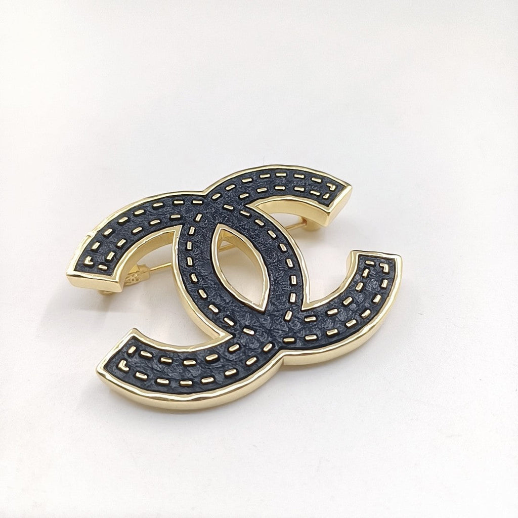 18K  Chanel Black Brooch