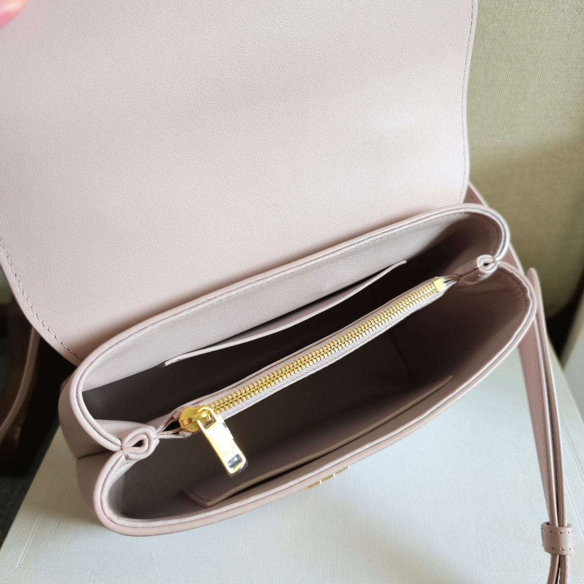 CELINE 25S NINO BAG 20MM IN LIGHT PINK GRAINED CALFSKIN GOLD HARDWARE