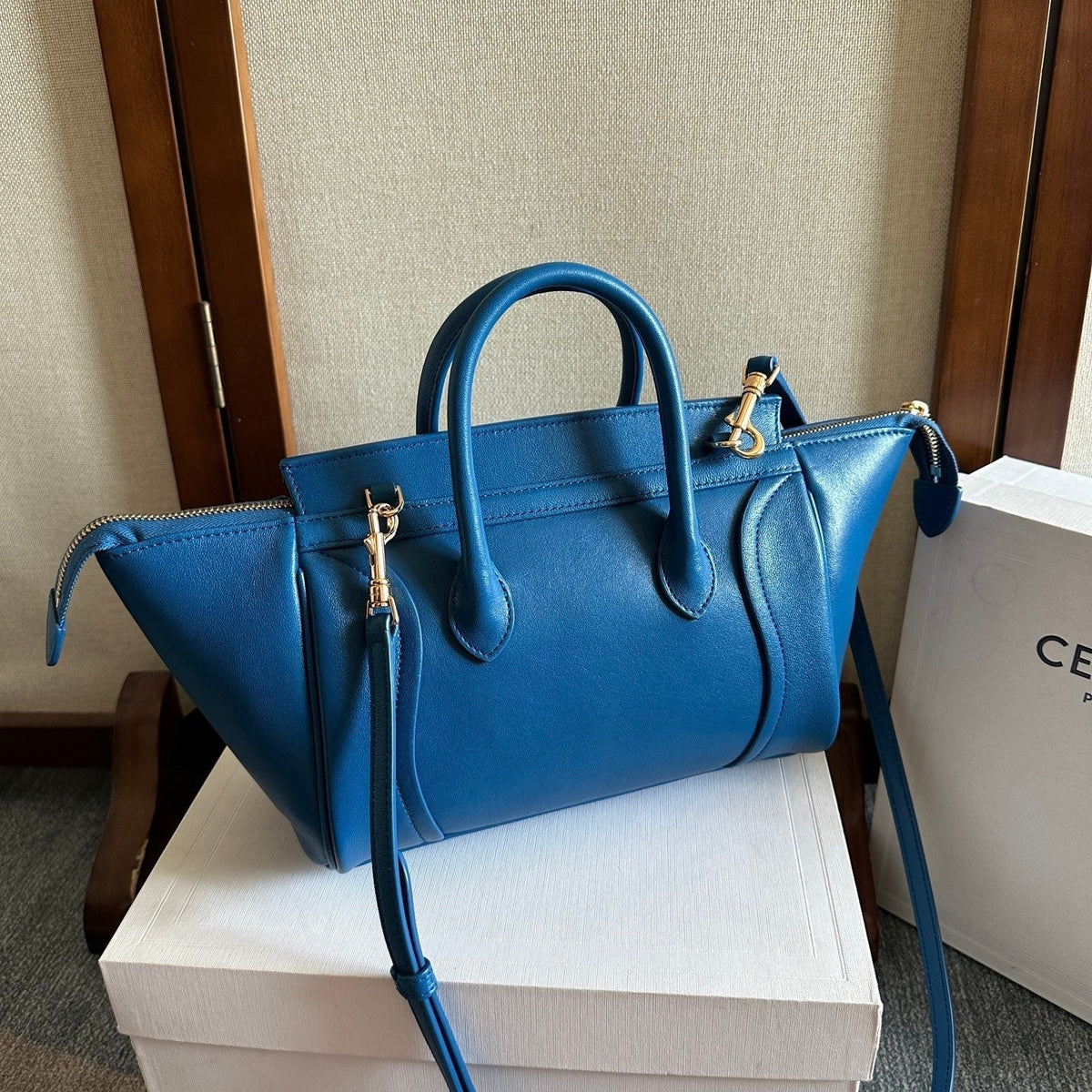CELINE 25S NEW LUGGAGE 36MM IN DARK BLUE CALFSKIN GOLD HARDWARE