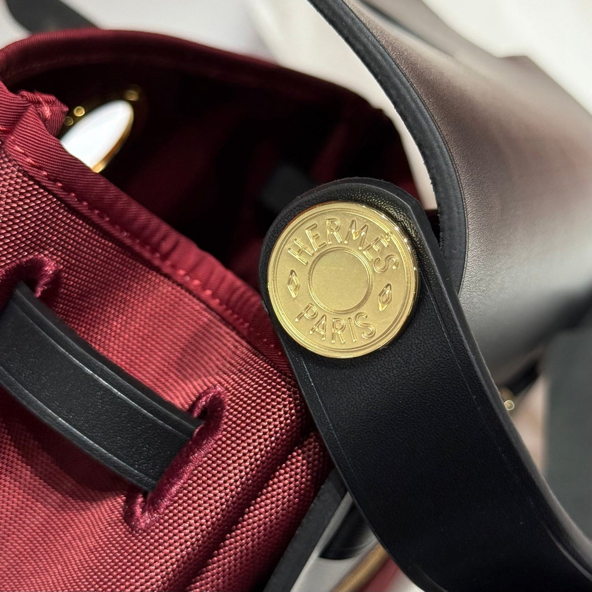 HERMES 25S MINI HERBAG 20 IN RED AND BLACK CANVAS GOLD HARDWARE