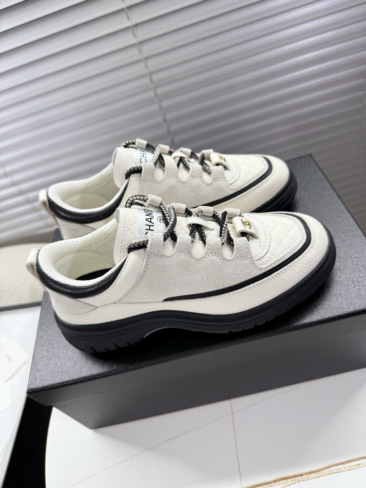 CHANEL 25S SNEAKERS 35MM IN WHITE CALFSKIN
