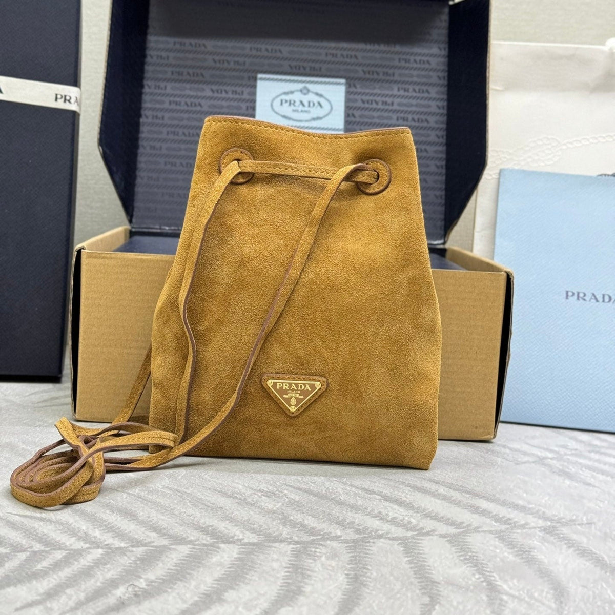 PRADA 25S BUCKET BAG 20 IN LIGHT CARAMEL SUEDE GOLD HARDWRE