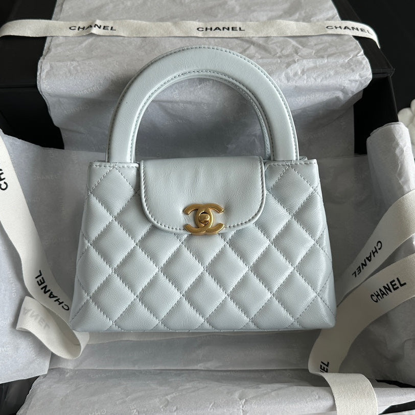 CHANEL VINTAGE KELLY 25S 19 CM IN PASTEL MINT GREEN LAMBSKIN WITH GOLD HARDWARE
