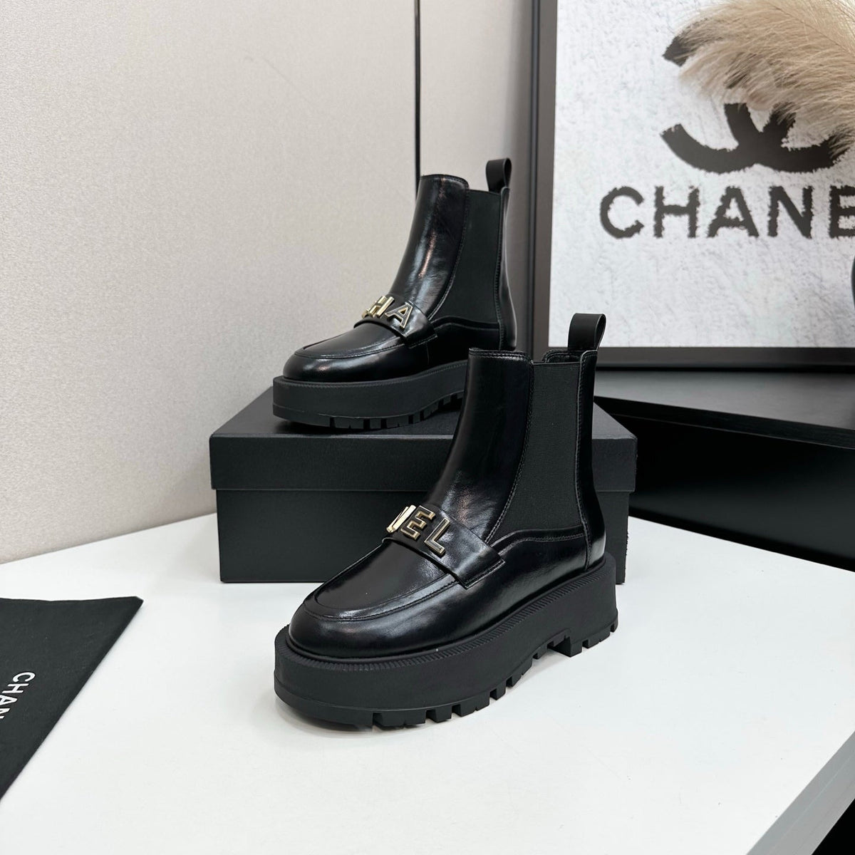 CHANEL 25S SHORT BOOTS IN BLACK CALFSKIN AND CANVAS