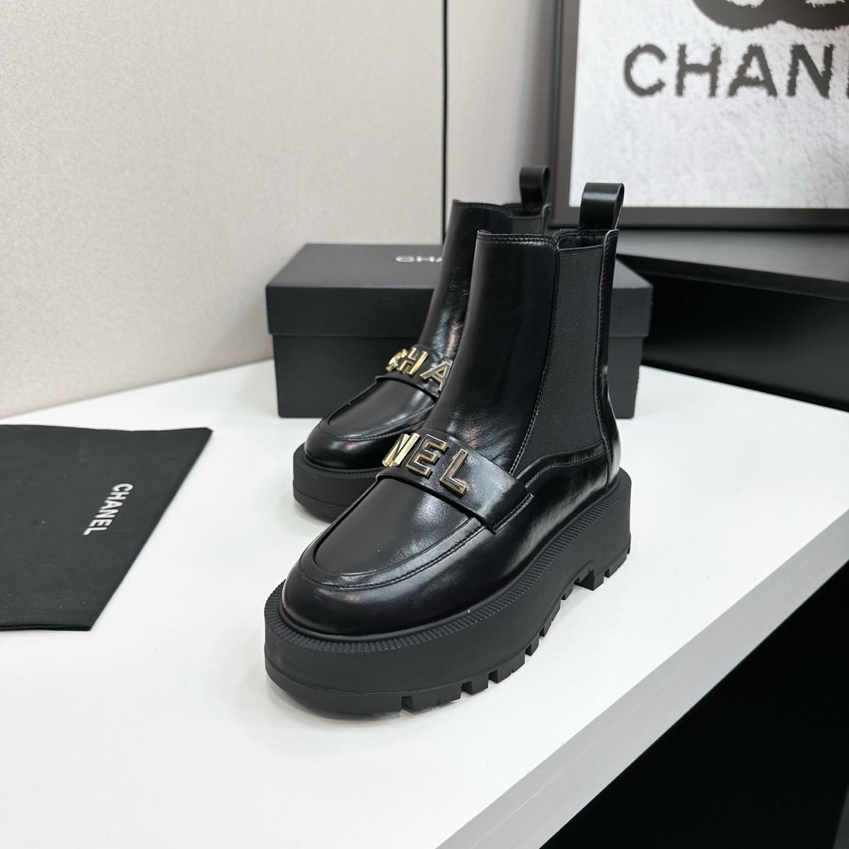 CHANEL 25S SHORT BOOTS IN BLACK CALFSKIN AND CANVAS