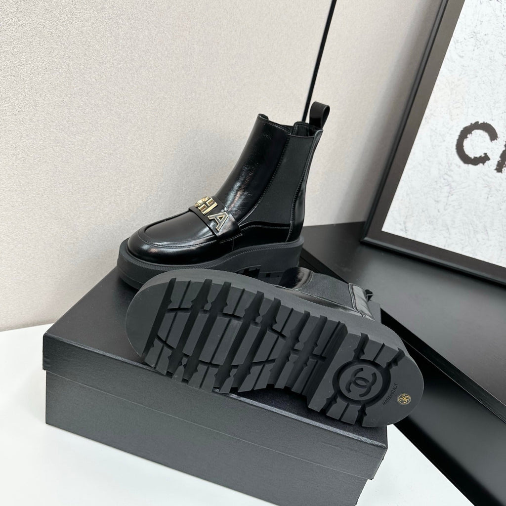CHANEL 25S SHORT BOOTS IN BLACK CALFSKIN AND CANVAS