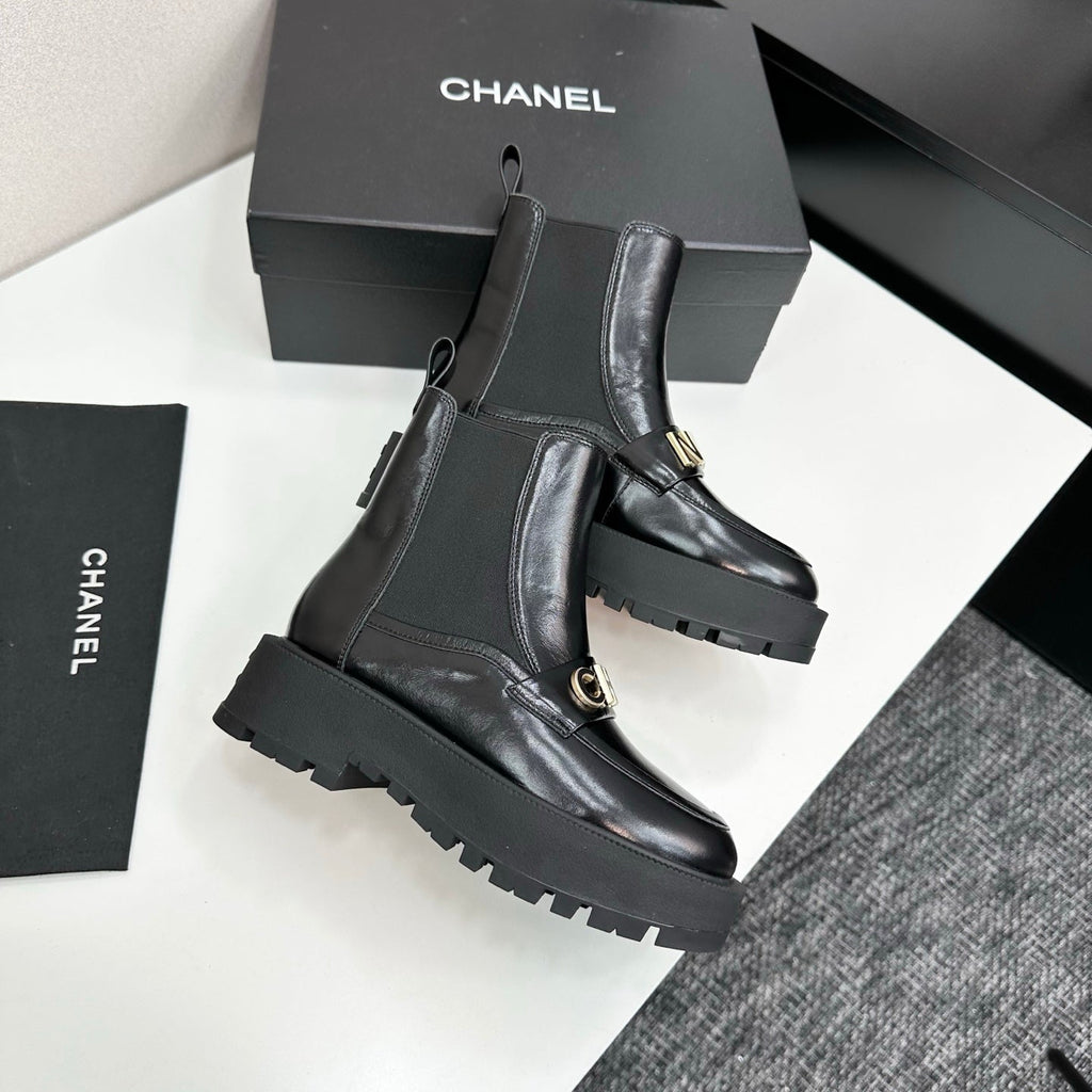 CHANEL 25S SHORT BOOTS IN BLACK CALFSKIN AND CANVAS