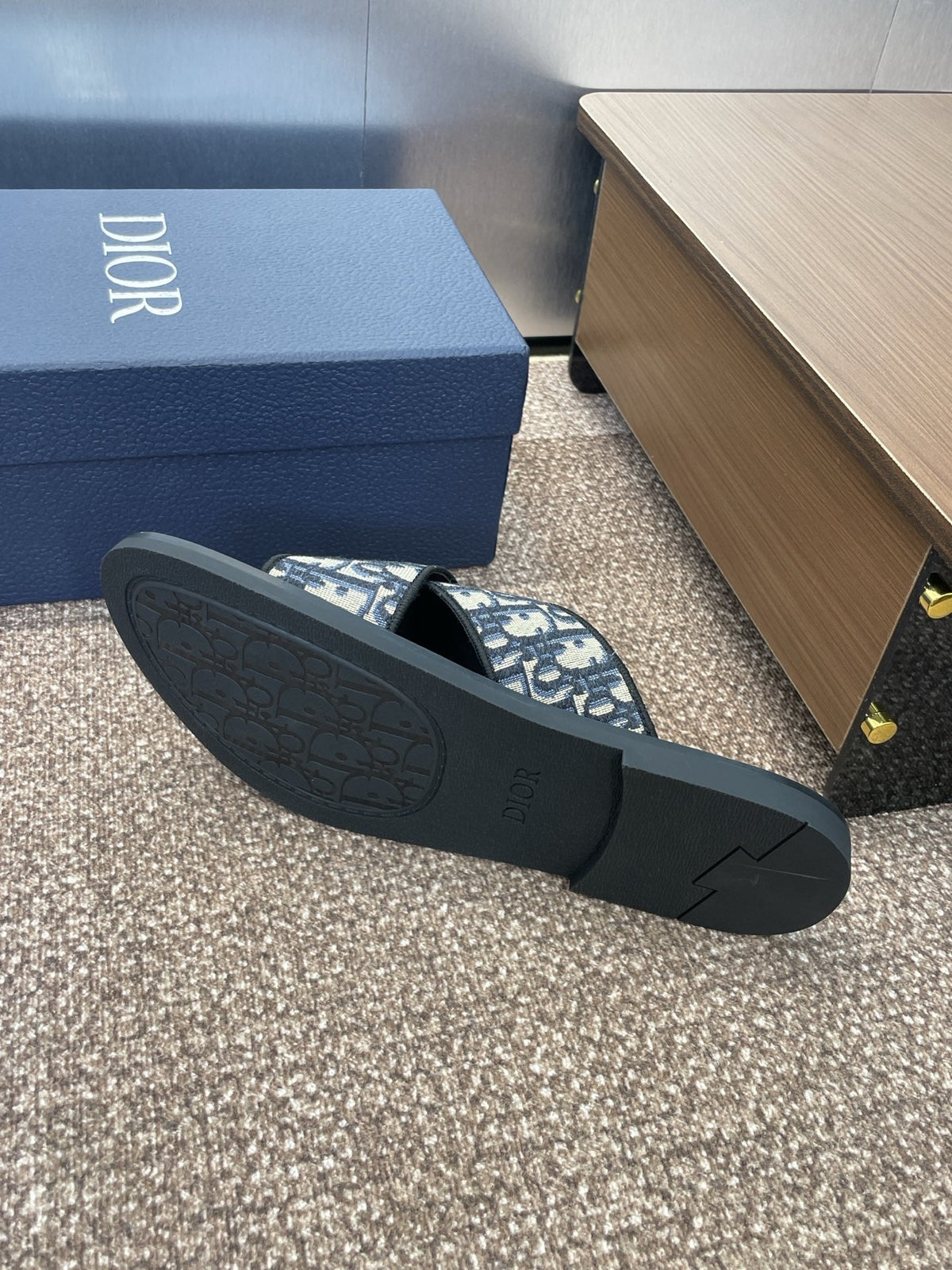 DIOR 25S ALIAS CROSS-STRAP SLIDES IN BLACK CALFSKIN WITH CD OBLIQUE DEEP BLUE LOGO