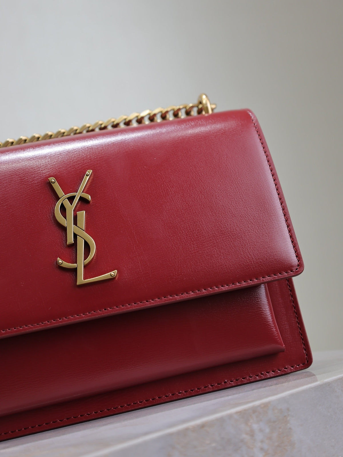 YSL 25S SUNSET BAG 22 IN CRIMSON RED CALFSKIN GOLD HARDWARE